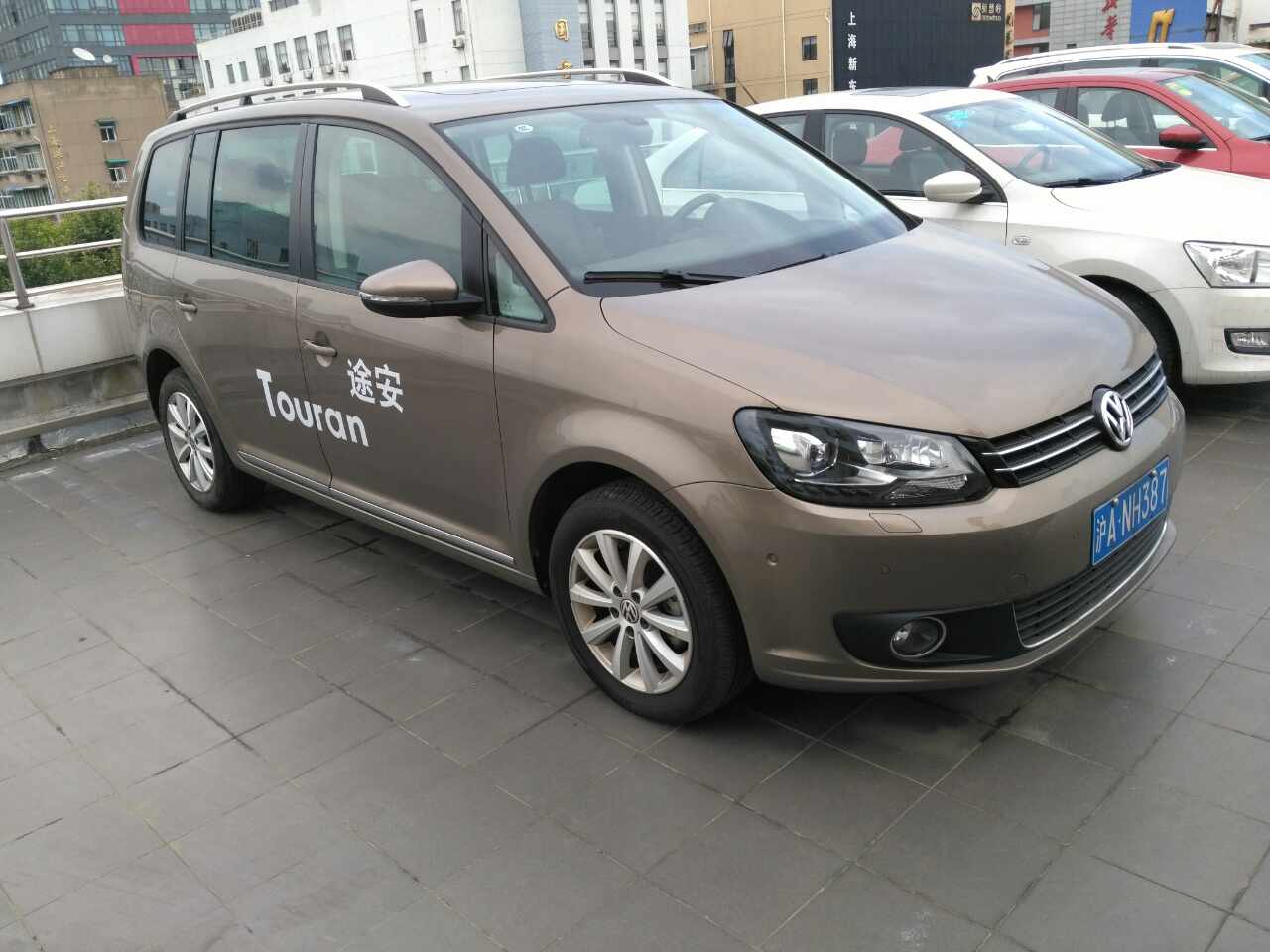 拐到大众,问了下老途安,1.4tdsg.裸车14.2,3月份的车最后一批.