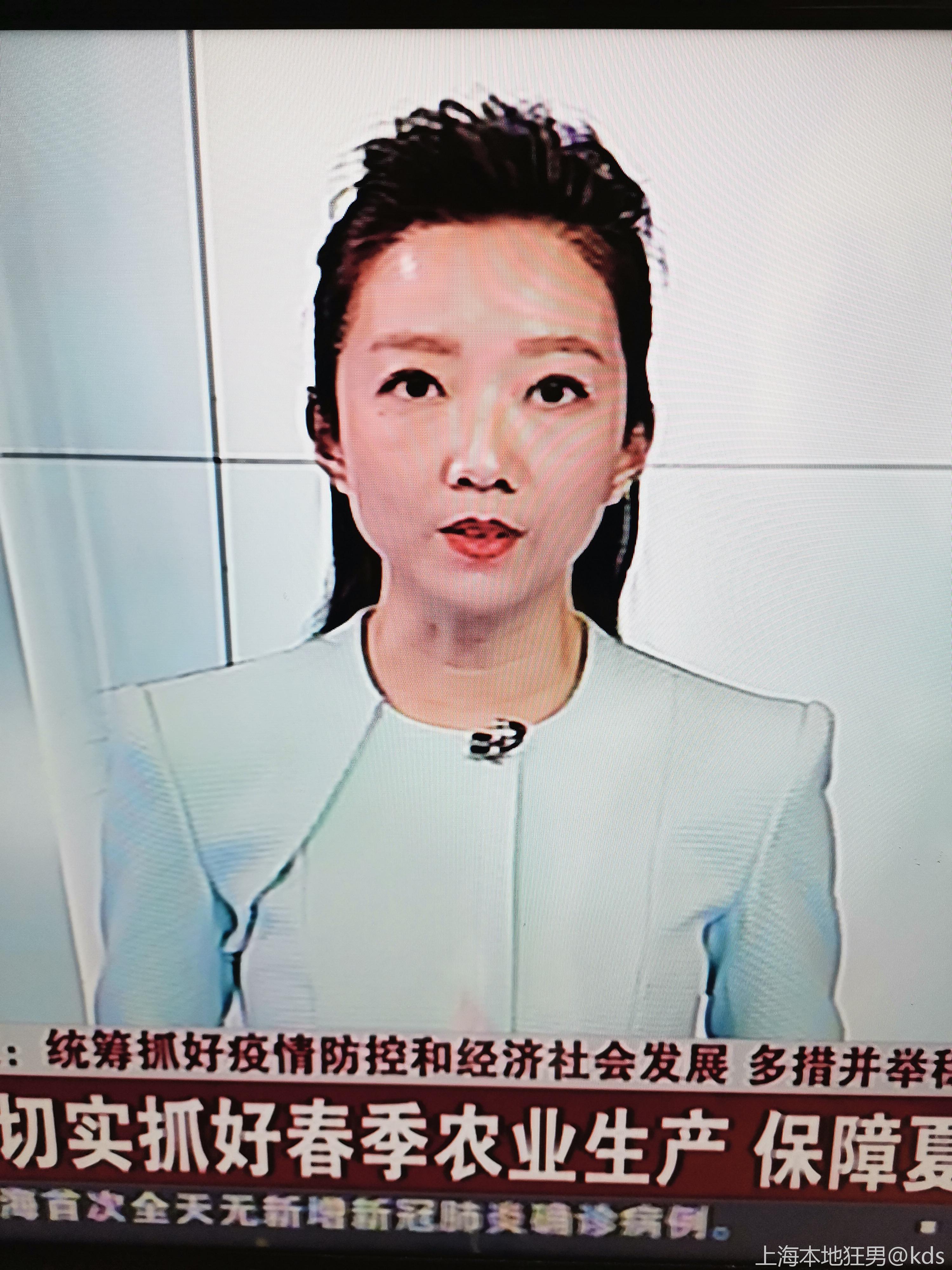 这个上海新闻台的女主持人很艳丽啊,是大美女哦